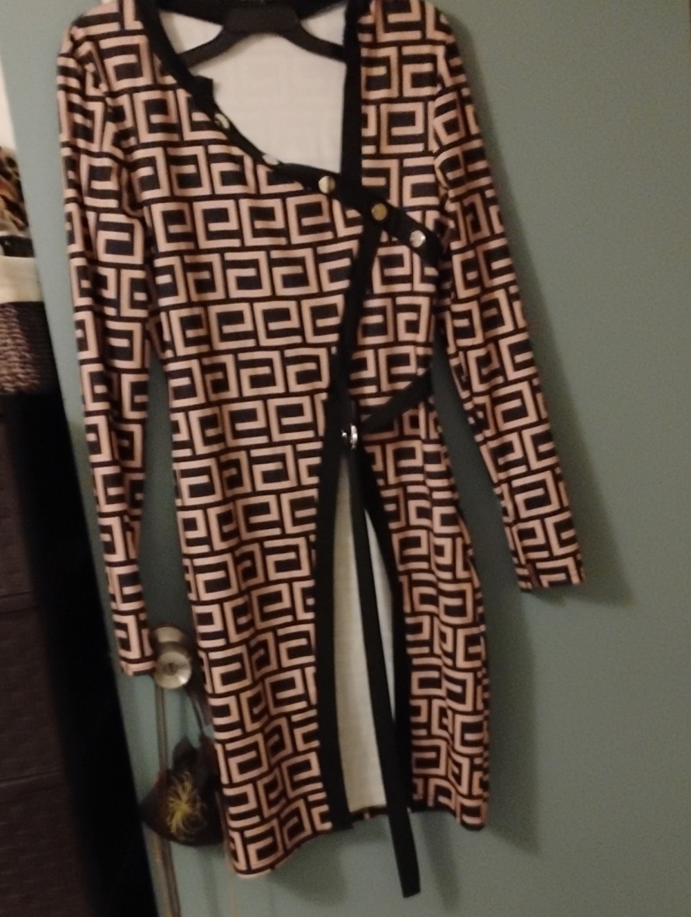 chic Black and Cream Geometric Wrap Jumpsuit